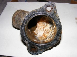 Sediment inside the thermostat housing on Rover V8.